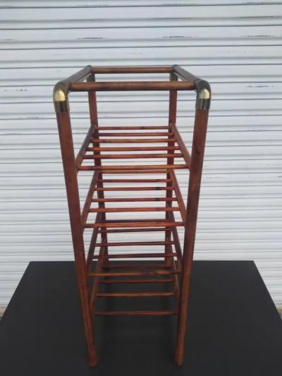 Bentwood wine rack with brass accents