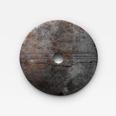 Bi Disc Engraved with Birds Fish and Taotie Masks