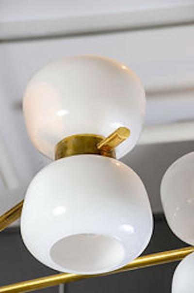 Brass and White Glass Chandeliers