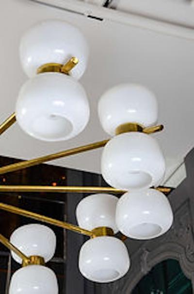 Brass and White Glass Chandeliers