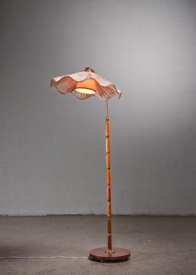 Brass and wood floor lamp