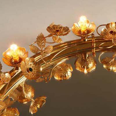 Brass flower lit up Gracie wall mirror
