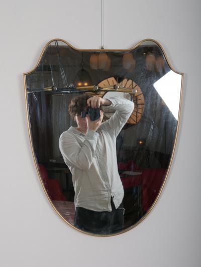 Brass frame shield shape mirror Italy c1950