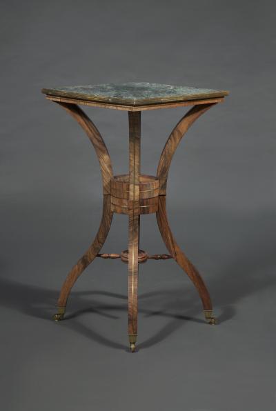 Brass inlaid rosewood center table possibly for the display of a sculpture