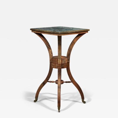 Brass inlaid rosewood center table possibly for the display of a sculpture