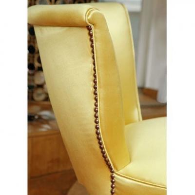 Brass studded upholstered seat