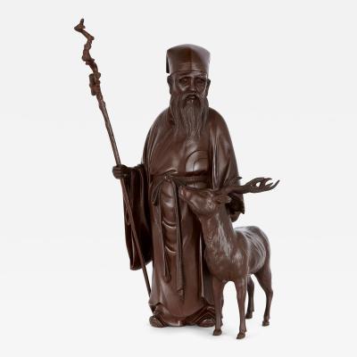 Bronze Meiji period sculpture of Jur jin God of Longevity with deer and staff