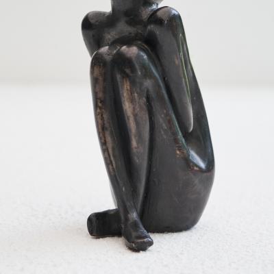 Bronze Sculpture of a Sitting Man