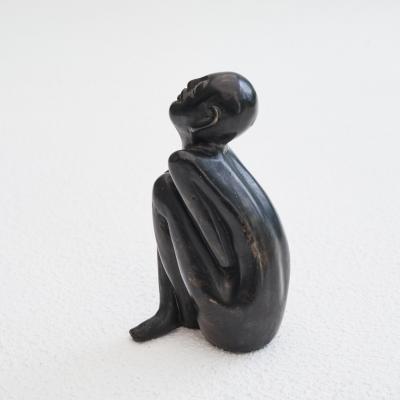 Bronze Sculpture of a Sitting Man