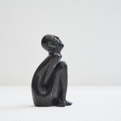 Bronze Sculpture of a Sitting Man