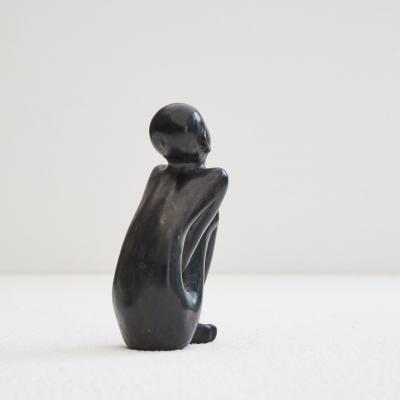 Bronze Sculpture of a Sitting Man