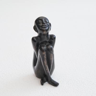 Bronze Sculpture of a Sitting Man