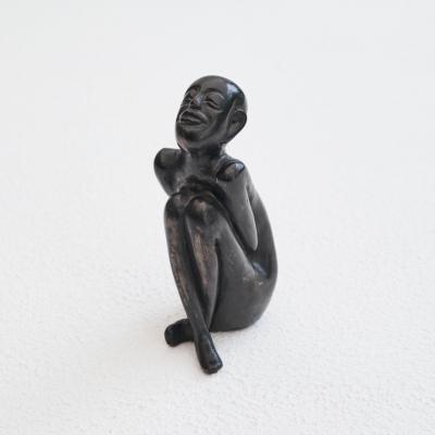 Bronze Sculpture of a Sitting Man