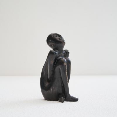 Bronze Sculpture of a Sitting Man