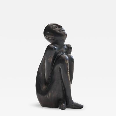 Bronze Sculpture of a Sitting Man