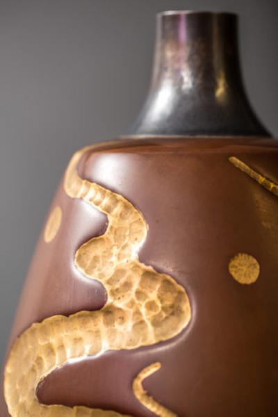 Bronze Vase with Gold Design and Silver Rim