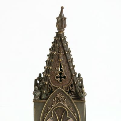 Bronze model of a Gothic church steeple with gilded detail and original glass 