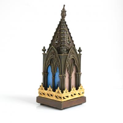 Bronze model of a Gothic church steeple with gilded detail and original glass 