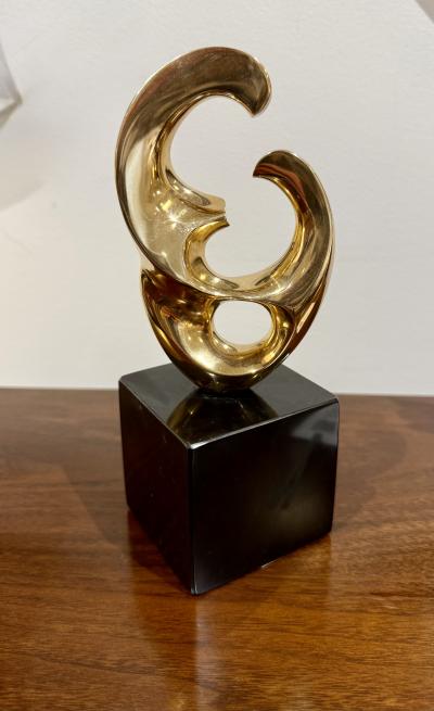 Bronze sculpture by Antonio Keiff Grediaga on a black stone base Canada 1986 