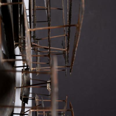 Brutalist Mid Century Sunburst Wall Sculpture in Mixed Metals by Stuart Mathews