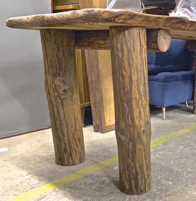 Brutalist awesome sand blasted organic dinning table with log legs