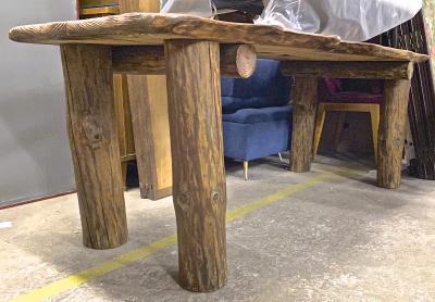 Brutalist awesome sand blasted organic dinning table with log legs