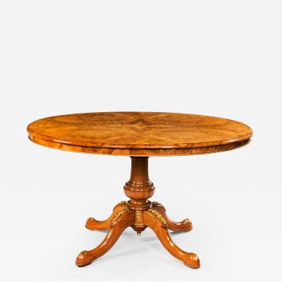 Burr walnut and ormolu mounted centre table with superb quartered veneered top 