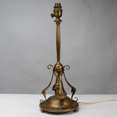 C F A Voysey An Arts Crafts Brass Table Lamp in the Style of C F A Voysey