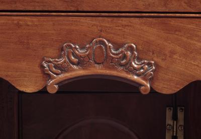 CHIPPENDALE KNEEHOLE DESK WITH BALL AND CLAW FEET AND A CARVED DRAWER