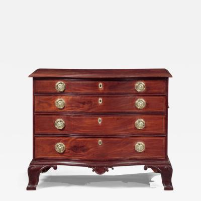 CHIPPENDALE SERPENTINE FRONT CHEST WITH CARVED OGEE BRACKET FEET