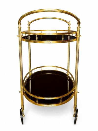 CIRCA 1960 TWO TIERED OVAL BRASS SERVING TROLLEY