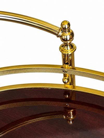CIRCA 1960 TWO TIERED OVAL BRASS SERVING TROLLEY