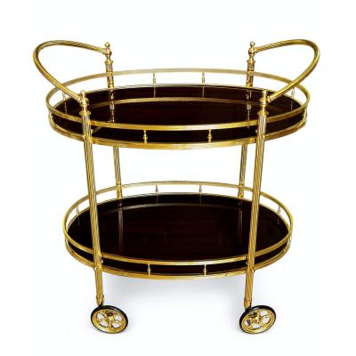 CIRCA 1960 TWO TIERED OVAL BRASS SERVING TROLLEY