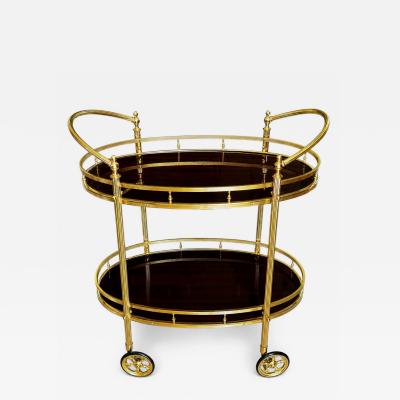 CIRCA 1960 TWO TIERED OVAL BRASS SERVING TROLLEY
