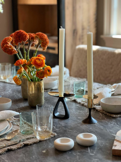 Carl Aub ck PAIR OF CANDLE HOLDERS WITH PATINATED TRIANGULAR BASE AND POLISHED TOP