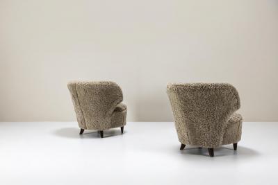 Carl Johan Boman Set of Two Carl Johan Boman Lounge Chairs in Sheepskin for Oy Boman Ab 1940s