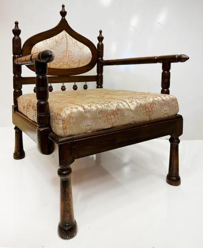 Carved End of Indo British Colonial Period Lounge Chairs Pair