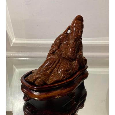 Carved Goldstone Sculpture of Recumbent Buddha