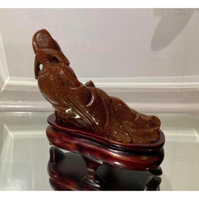 Carved Goldstone Sculpture of Recumbent Buddha