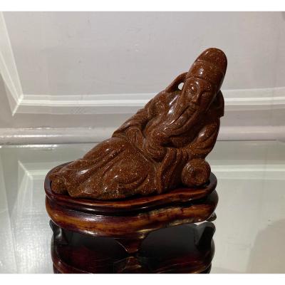Carved Goldstone Sculpture of Recumbent Buddha