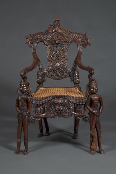 Carved Indian Rosewood Armchair With Legs In The Form Of Standing Soldiers