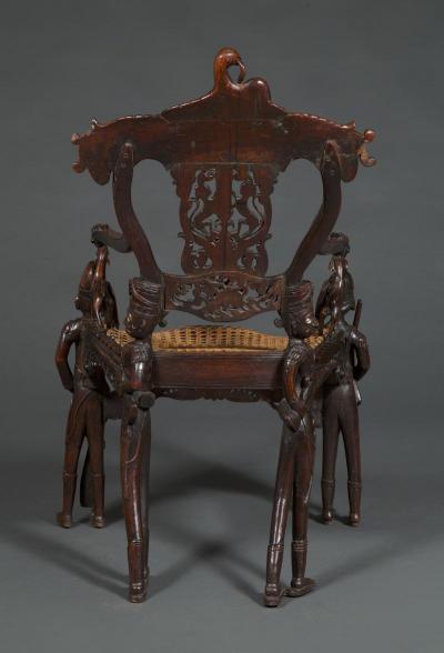 Carved Indian Rosewood Armchair With Legs In The Form Of Standing Soldiers