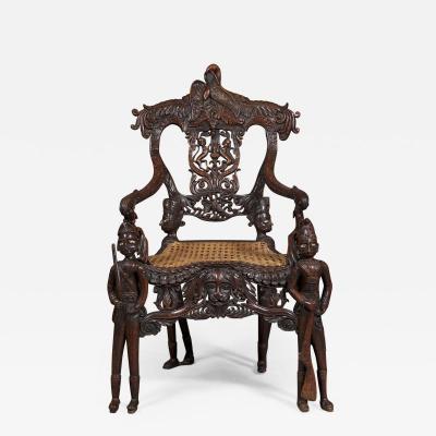 Carved Indian Rosewood Armchair With Legs In The Form Of Standing Soldiers
