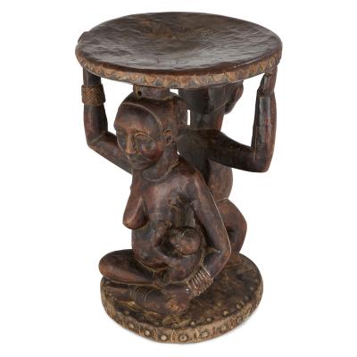 Carved Luba caryatid stool with human figures Democratic Republic of Congo