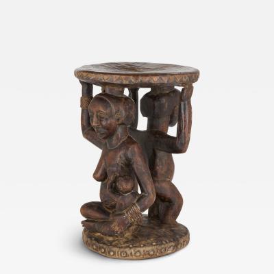 Carved Luba caryatid stool with human figures Democratic Republic of Congo