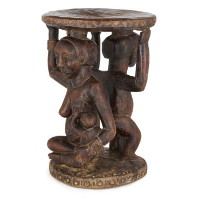 Carved Luba caryatid stool with human figures Democratic Republic of Congo