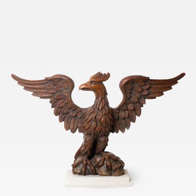 Carved wooden eagle with wings spread