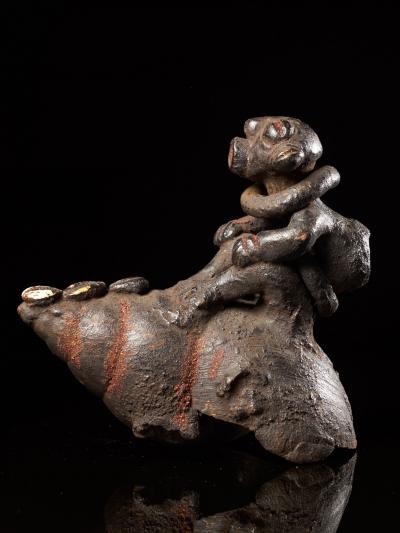 Ceremonial Monkey Figure on a Snailshell Bulu People Cameroon