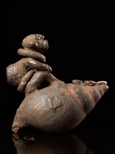 Ceremonial Monkey Figure on a Snailshell Bulu People Cameroon
