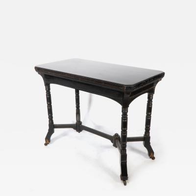 Charles Bevan Bevan Marsh Jones Cribb An Aesthetic Movement walnut ebonized card table